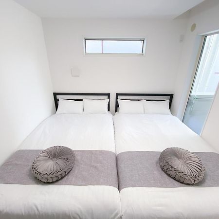 Residential Hotel Glitter Usjまで1駅5分 Osaka Esterno foto