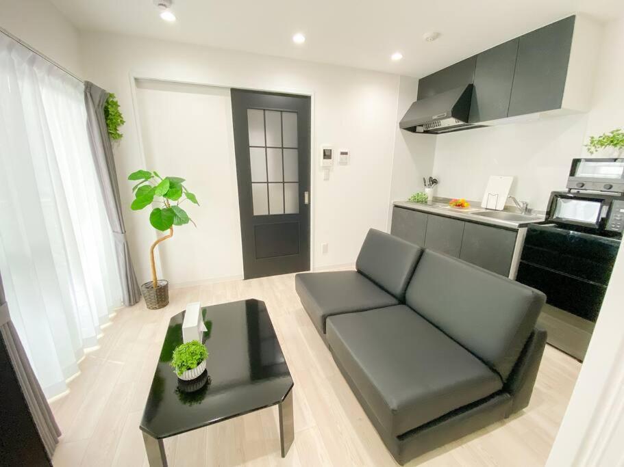 Residential Hotel Glitter Usjまで1駅5分 Osaka Camera foto