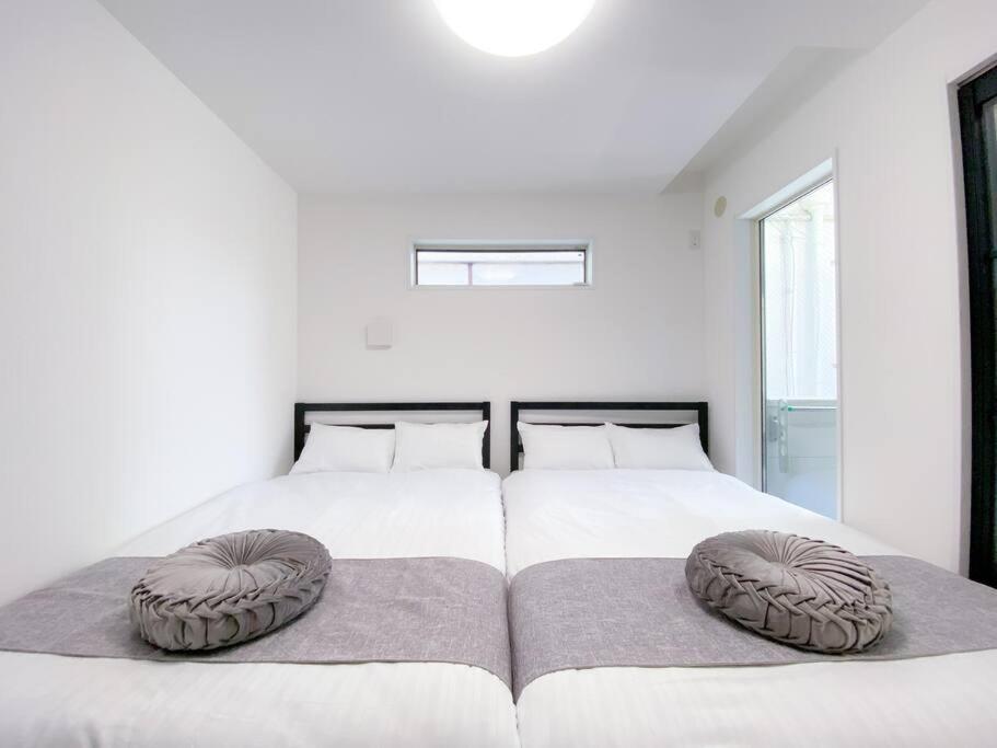 Residential Hotel Glitter Usjまで1駅5分 Osaka Esterno foto