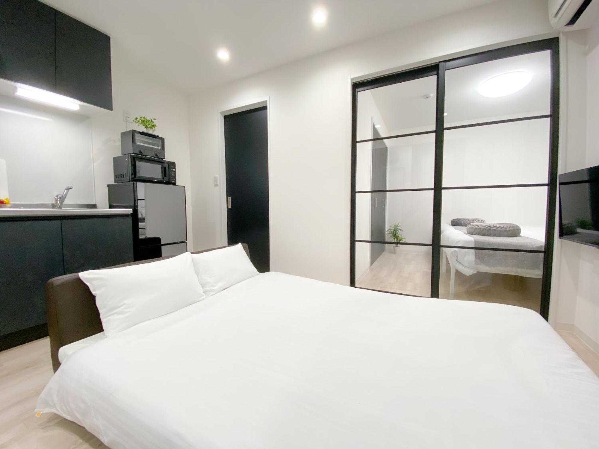 Residential Hotel Glitter Usjまで1駅5分 Osaka Esterno foto