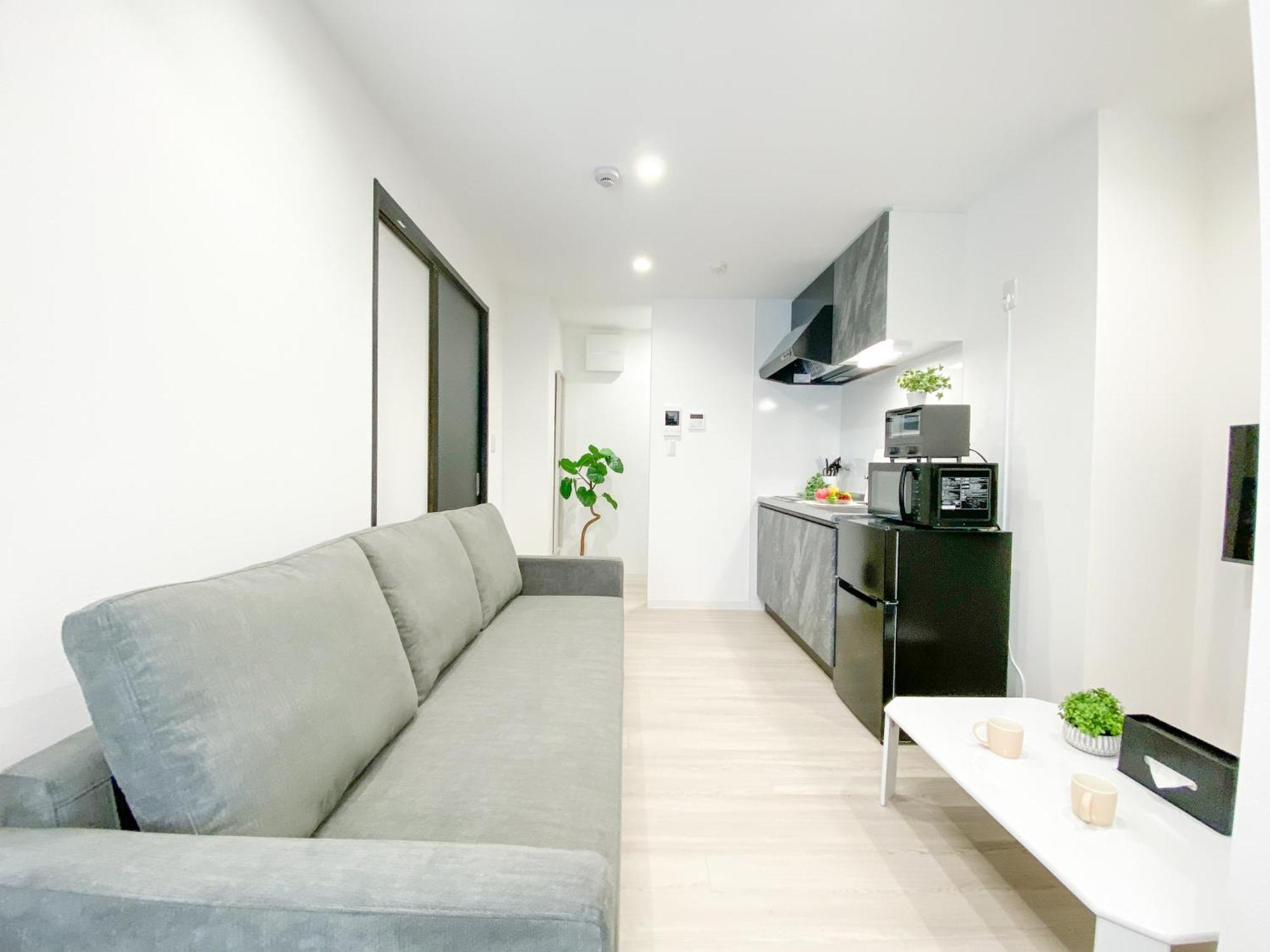 Residential Hotel Glitter Usjまで1駅5分 Osaka Camera foto